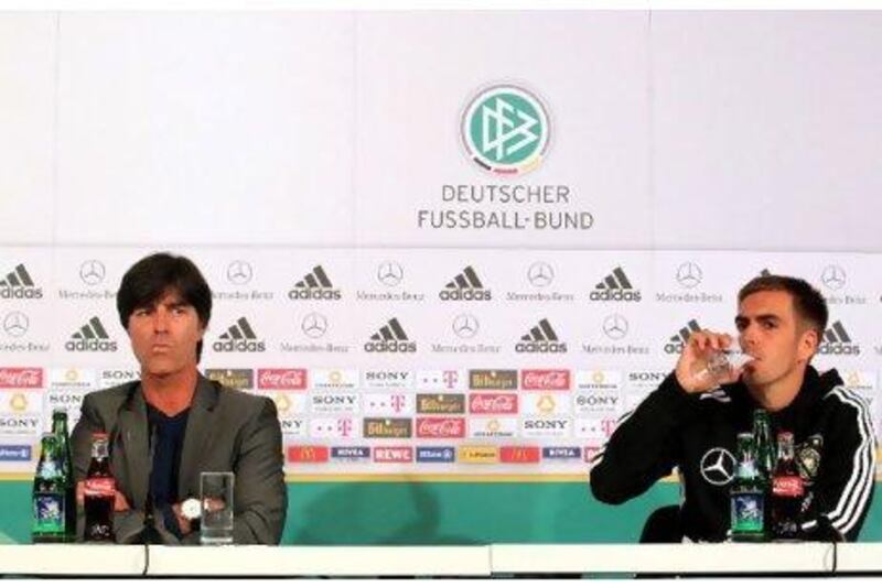 The recently published autobiography of Philipp Lahm, right, in which the Germany captain criticised the coach Joachim Loew, left, has caused uneccessary problems in a squad that is on the cusp of Euro 2012 qualification.