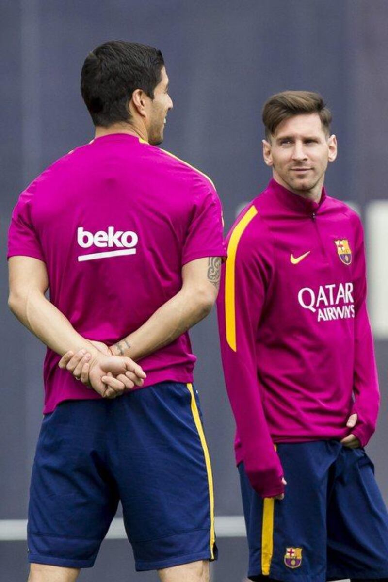 FC Barcelona’s players Uruguayan Luis Suarez (L) and Argentine Leo Messi attend a training session at the team’s Joan Gamper sports complex in the outside of Barcelona, northeastern Spain, 13 may 2016. FC Barcelona will face Granada CF in the last match of Spain’s La Liga season on 14 May. EPA/Quique Garcia