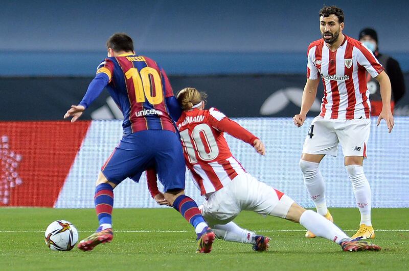 Barcelona's Lionel Messi and Bilbao forward Iker Muniain. AFP