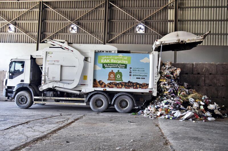 A truck dumps waste at the Material Recovery Facility during its opening ceremony in Ras Al Khaimah, UAE, Wednesday, Nov. 27, 2019. Shruti Jain The National