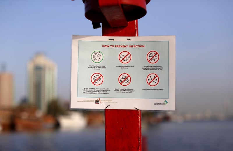 A sign showing how to prevent infection is seen in Dubai. Getty Images