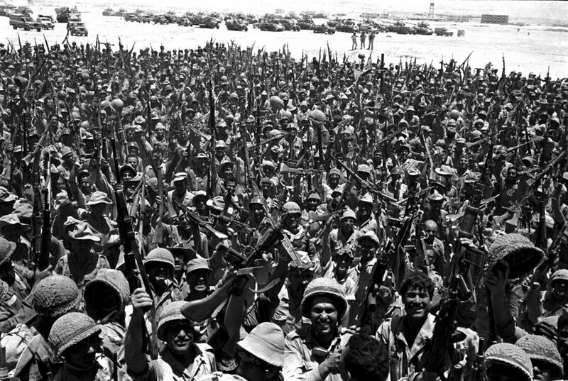 Israel troops wave their guns around in June 1967 after having made it to the Sinai deserts of Egypt. AP Photo