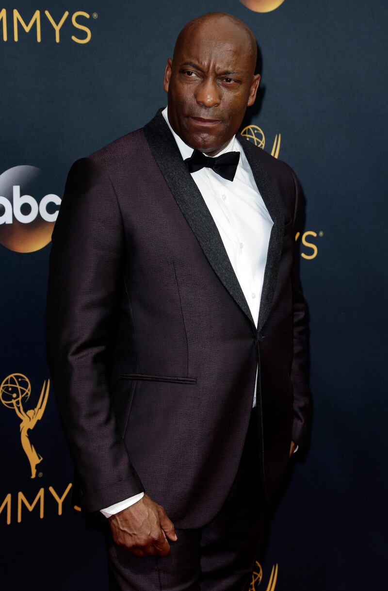 epa07537064 (FILE) - UD director John Singleton arrives for the 68th annual Primetime Emmy Awards ceremony held at the Microsoft Theater in Los Angeles, California, USA, 18 September 2016 (reissued 29 April 2019). According to media reports, John Singleton has died, citing his family. The 51-year-old writer and director of 'Boyz n the Hood' had suffered a stroke two weeks ago and was in a coma.  EPA/PAUL BUCK *** Local Caption *** 53025183