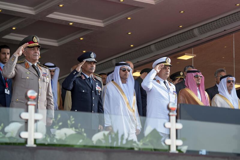 EL HAMAM, MATROUH GOVERNORATE, EGYPT - July 22, 2017: HH Sheikh Hazza bin Zayed Al Nahyan, Vice Chairman of the Abu Dhabi Executive Council (4th R) and HH Lt General Sheikh Saif bin Zayed Al Nahyan, UAE Deputy Prime Minister and Minister of Interior (R), stand for the national anthem during the inauguration of the Mohamed Naguib Military Base. Seen with General Mahmoud Hegazy Chief of Staff of the Armed Forces of Egypt  (L).

( Rashed Al Mansoori / Crown Prince Court - Abu Dhabi )
---