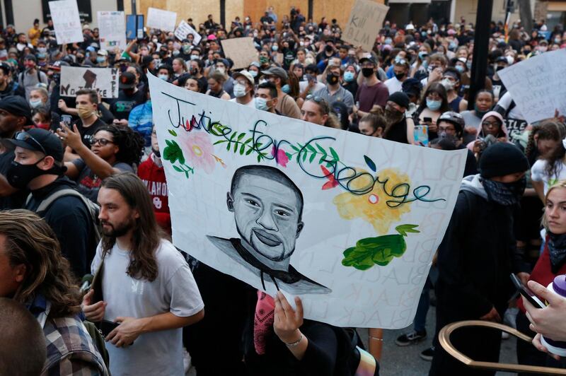 Protesters march through central Sacramento, California. in memory of George Floyd. AP Photo