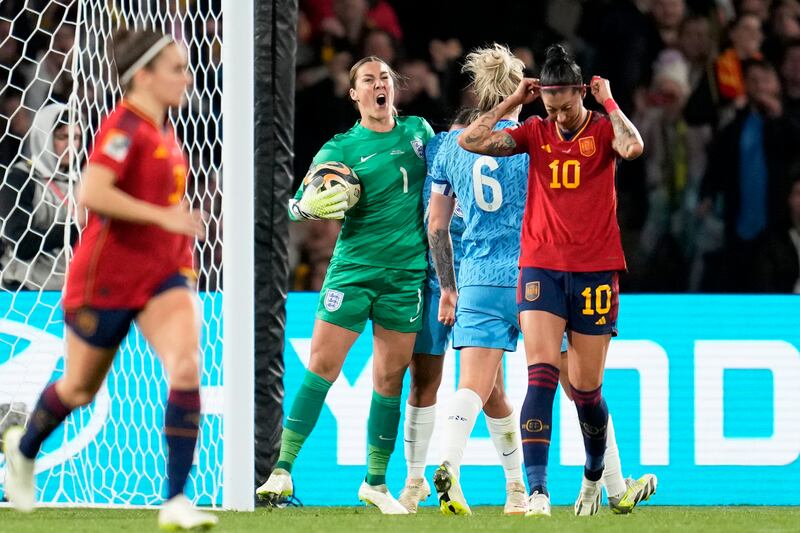 England's goalkeeper Mary Earps reacts after saving a penalty from Spain's Jennifer Hermoso. AP 