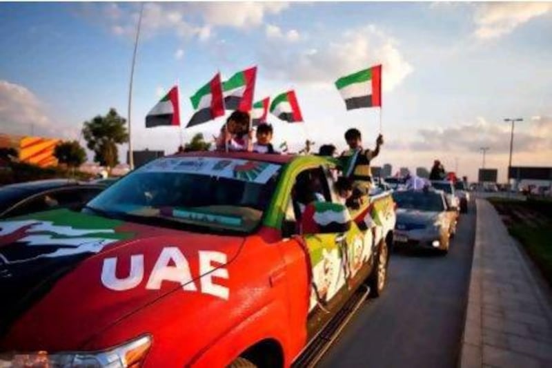 People join in celebration during the Spirit of Union Parade on December 1 last year at Yas Island.