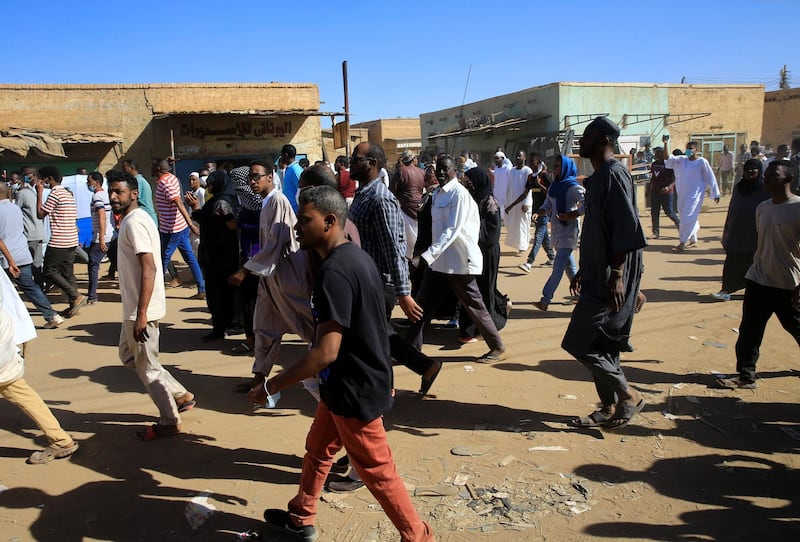Sudanese demonstrators march along the street during anti-government protests after Friday prayers in Khartoum, Sudan January 11, 2019. REUTERS/Mohamed Nureldin Abdallah