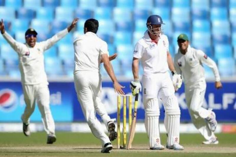 Pakistan celebrate the dismissal of Andrew Strauss whose England side struggled in the the UAE earlier this year. Gareth Copley / Getty Images