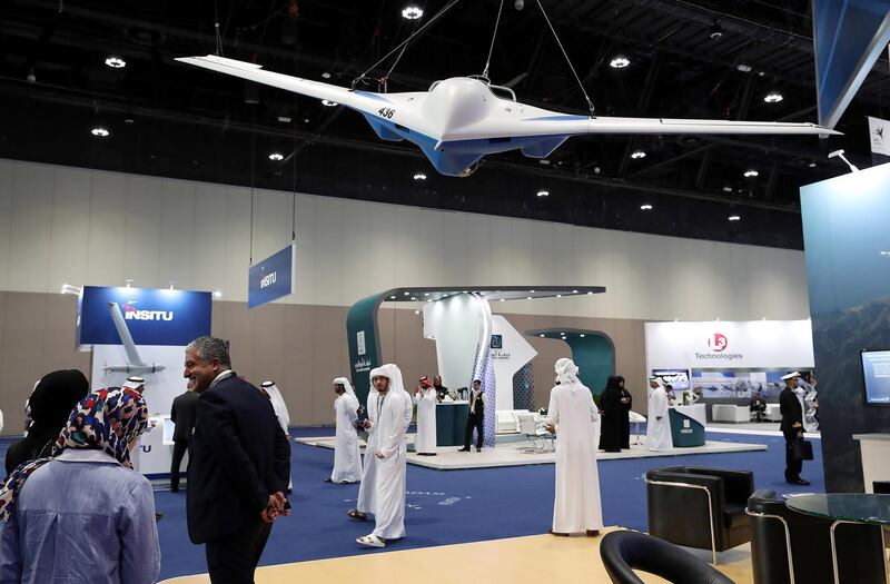 
ABU DHABI , UNITED ARAB EMIRATES , FEB 26  – 2018 :- Visitors at the Lockheed Martin stand on the second day of UMEX held at ADNEC in Abu Dhabi. ( Pawan Singh / The National ) For News
