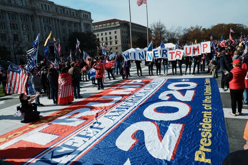 Supporters of US President Donald Trump gather to support his legal challenges to the 2020 presidential election, in Freedom Plaza, in Washington, DC.  EPA