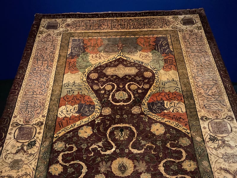 A prayer rug from 1900 created by an Armenian weaver in the Ottoman Empire. Razmig Bedirian / The National