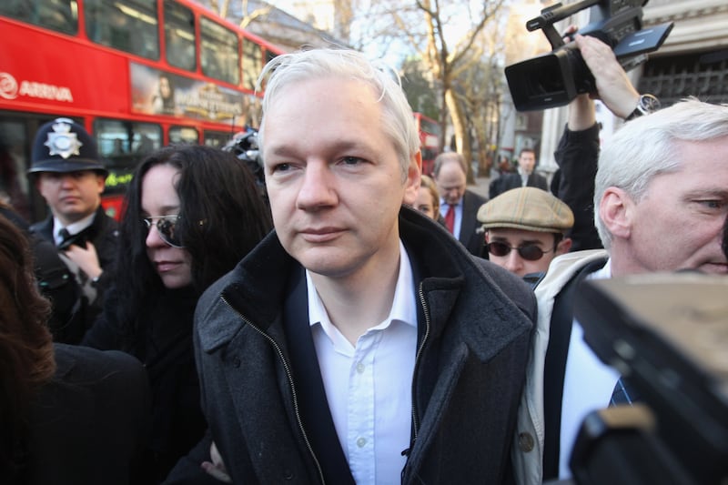 Mr Assange arrives at the High Court in London in December 2011. Getty Images