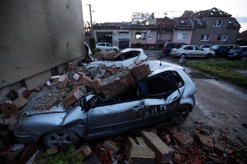 Damaged cars and houses in the village of Moravska Nova Ves, Czech Republic, on June 25, 2021. Reuters
