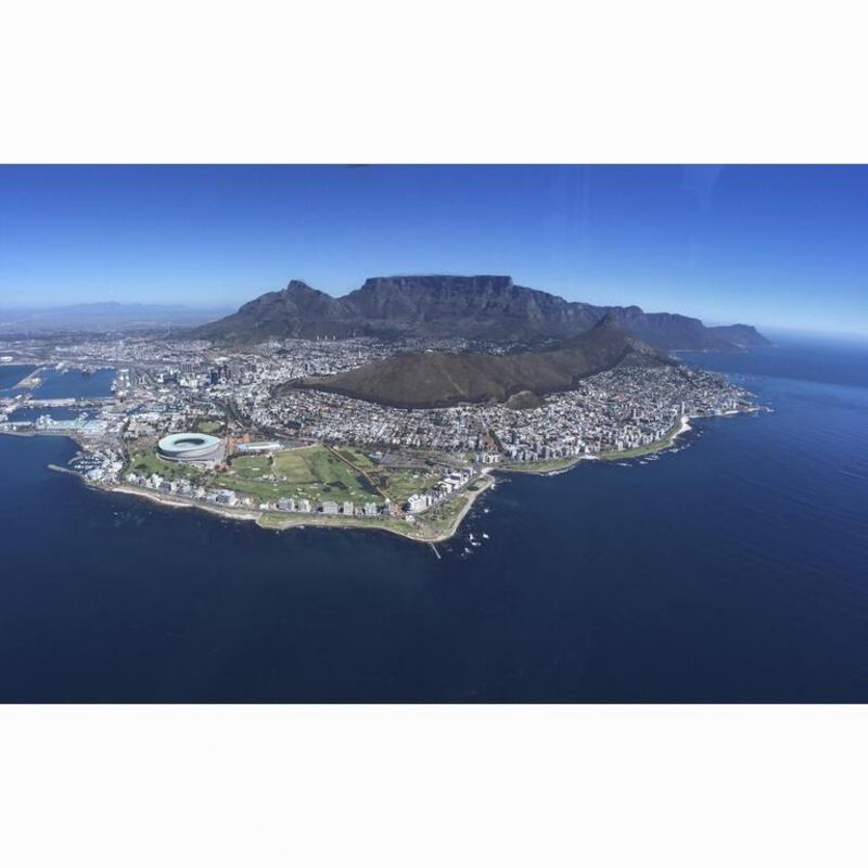 Cape Town, aurrounding areas and Table Mountain from a helicopter overlooking the Cape Peninsula. Antonie Robertson