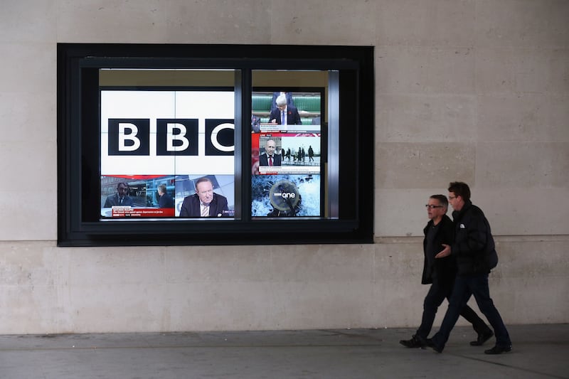 A bank of television screens displaying BBC channels at the BBC headquarters in London. Getty