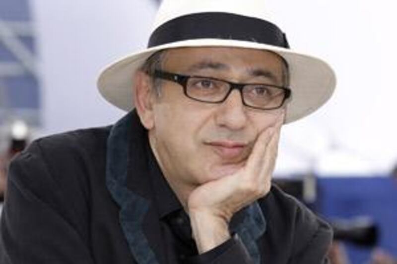 Elia Suleiman at the Cannes Film Festival promoting his latest film.