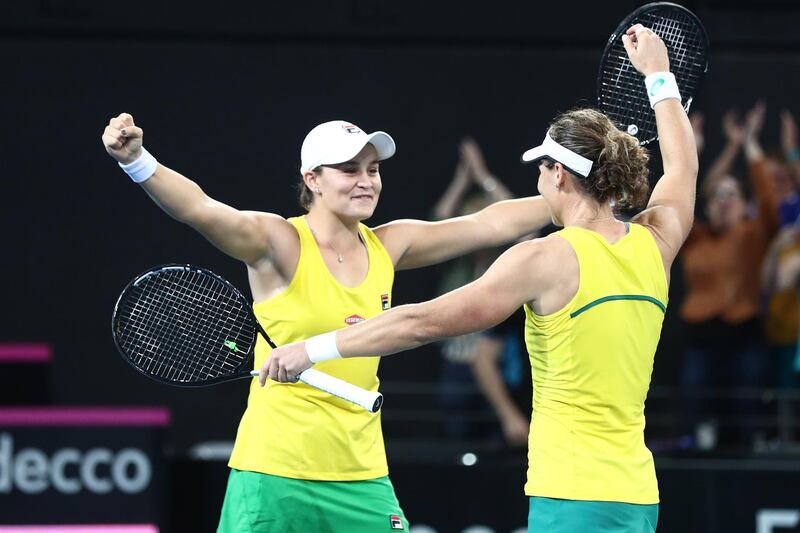 BRISBANE, AUSTRALIA - APRIL 21:  Samantha Stosur and Ashleigh Barty of Australia celebrate winning their doubles match against Victoria Azarenka and Aryna Sabalenka of Belarus during the Fed Cup World Group Semi Final - Australia v Belarus at Pat Rafter Arena on April 21, 2019 in Brisbane, Australia. (Photo by Chris Hyde/Getty Images)