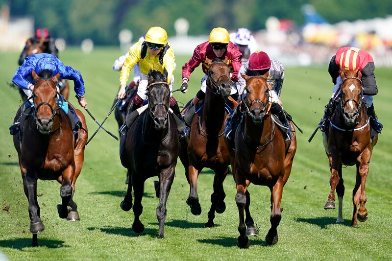 William Buick and Coroebus, left, win The St James's Palace Stakes at Royal Ascot. Getty 