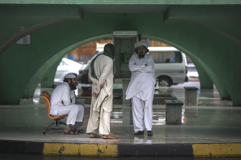 Abu Dhabi residents woke up to a gloomy and rainy weather on Wednesday morning, March 26 2014. Silvia Razgova / The National