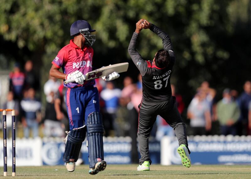 Dubai, United Arab Emirates - January 31, 2019: UAE's captain Mohammad Naveed takes the caught and bowled of Nepal's Sompal Kami in the the match between the UAE and Nepal in an international T20 series. Thursday, January 31st, 2019 at ICC, Dubai. Chris Whiteoak/The National