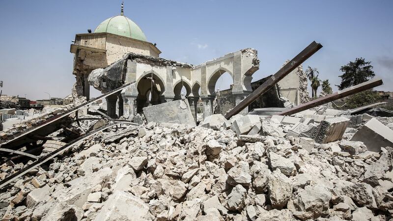 The destroyed gate of the Al-Nuri Mosque in the Old City of Mosul, during the Iraqi government forces' offensive to retake the city from ISIL fighters. Ahmad Al Rubaye / AFP