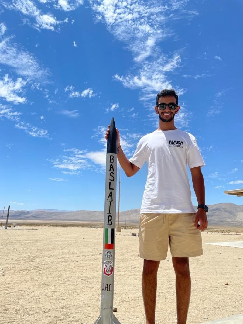 Sultan Baslaib, a student at Khalifa University, displays the rocket he built during an education programme in the US.