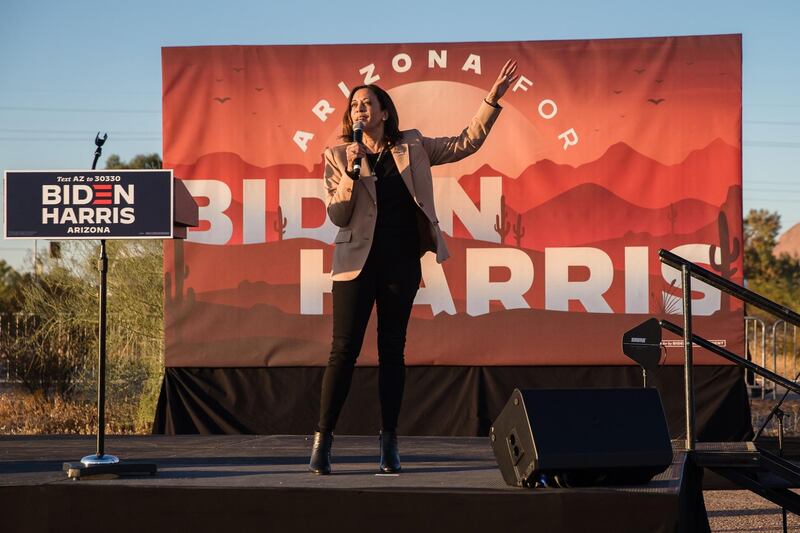 California Senator and Democratic vice presidential nominee Kamala Harris speaks during a drive-in campaign rally in Phoenix, Arizona on October 28, 2020.  / AFP / ARIANA DREHSLER
