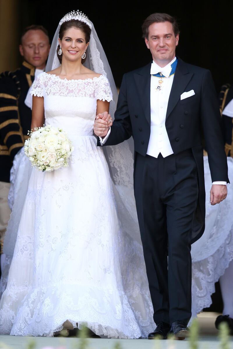 STOCKHOLM, SWEDEN - JUNE 08:  Princess Madeleine of Sweden and Christopher O'Neill depart from the wedding ceremony of Princess Madeleine of Sweden and Christopher O'Neill hosted by King Carl Gustaf XIV and Queen Silvia at The Royal Palace on June 8, 2013 in Stockholm, Sweden.  (Photo by Andreas Rentz/Getty Images)