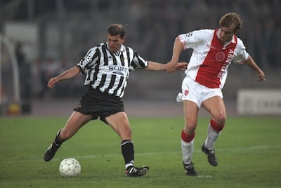 23 Apr 1997:  Zinedine Zidane of Juventus plays the ball closley watched marked by Richard Witchge of Ajax during the Champions League Semi-Final second leg at the Stadio Della Alpi in Turin, Italy. Juventus won 4-1 on the night and 6-1 on aggregate. \ Mandatory Credit: Shaun Botterill /Allsport/Getty Images