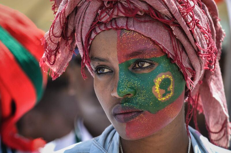 A woman takes part in celebrations for the return of the formerly banned anti-government group the Oromo Liberation Front at Mesquel Square in Addis Ababa, Ethiopia. AFP