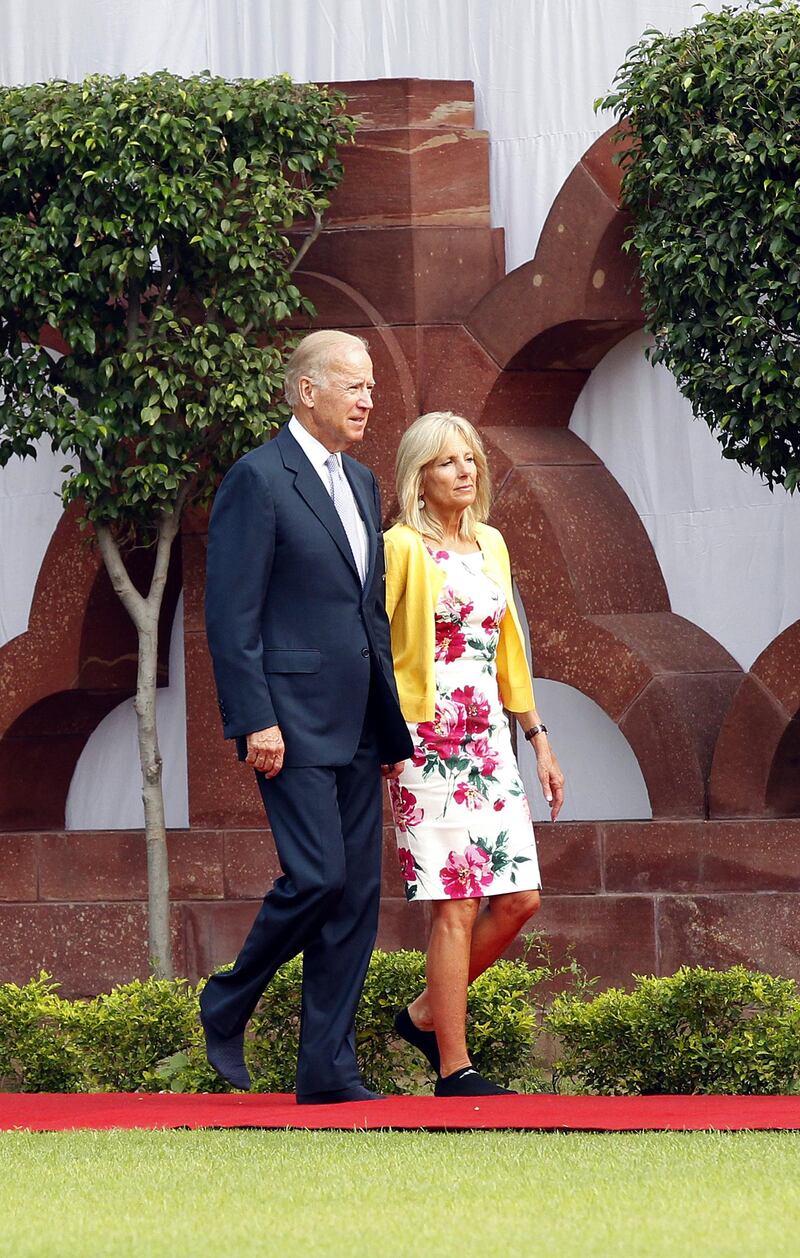 epa03797220 US Vice President Joe Biden (L) and his wife Jill Biden (R) arrive at the Gandhi Smriti, a museum dedicated to Mahatma Gandhi, in New Delhi, India, 22 July 2013. Joe Biden arrived in India for a four-day visit to boost the ties in trade, energy, defense and security.  EPA/HARISH TYAGI