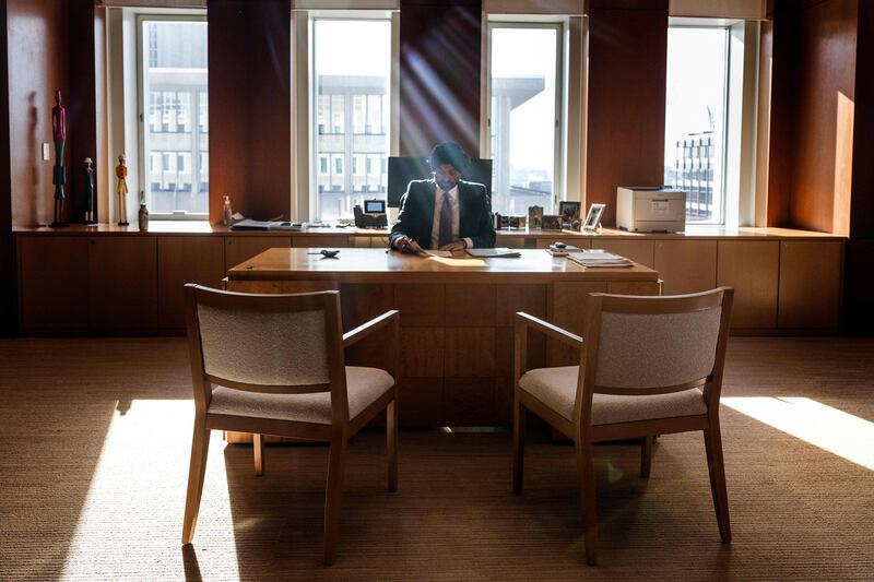 World Bank President Ajay Banga works at his desk at the bank's headquarters in Washington, US. AFP