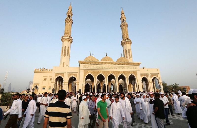 People arriving for the Eid Al Fitr morning prayer at Zabeel Mosque in Dubai. Pawan Singh / The National