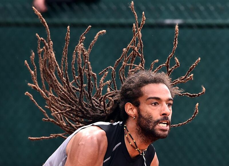 Dustin Brown of Germany plays Dudi Sela of Israel during their men’s single first round match at the French Open tennis tournament at Roland Garros in Paris, France, 23 May 2016. Christophe Petit Tesson /  EPA