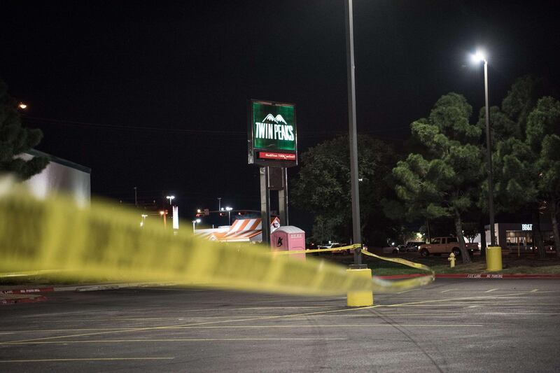 Police tape marks the scene outside a Twin Peaks restaurant after multiple people were shot in Odessa, Texas. Officials say an unidentified suspect was shot and killed after killing 5 people and injuring 21 in Odessa and nearby Midland. AFP
