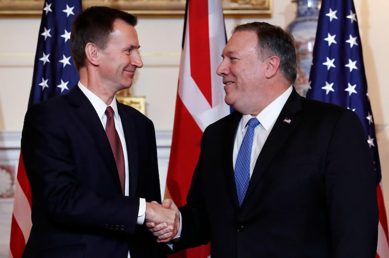 Secretary of State Mike Pompeo, right, shakes hands with British Foreign Secretary Jeremy Hunt, Thursday, Jan. 24, 2019, at the Department of State, in Washington. (AP Photo/Jacquelyn Martin)