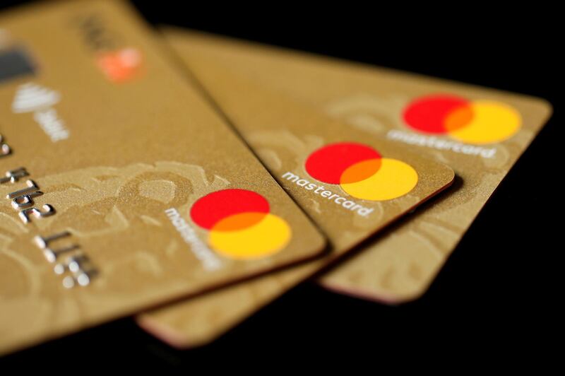 FILE PHOTO: Mastercard Inc. credit cards are displayed in this picture illustration taken December 8, 2017. REUTERS/Benoit Tessier/Illustration/File Photo