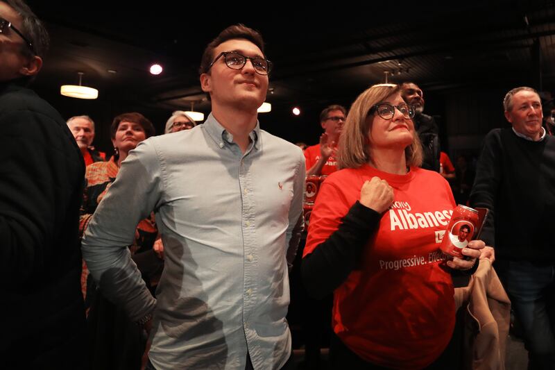 Supporters celebrate during the Labor Party election night event at Canterbury-Hurlstone Park RSL Club in Sydney. Labor is four seats short of the 76 needed for an outright majority in the 151 lower house. Getty Images