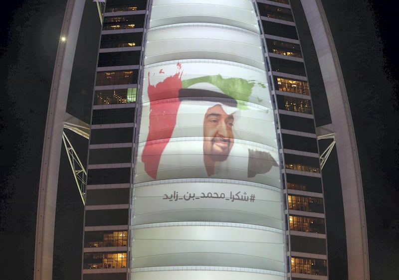 Dubai, United Arab Emirates - January 3rd, 2018: His Highness Sheikh Mohamed bin Zayed Al Nahyan, Crown Prince of Abu Dhabi is projected onto the Burj Al Arab. Wednesday, January 3rd, 2018 at Burj Al Arab, Dubai. Chris Whiteoak / The National