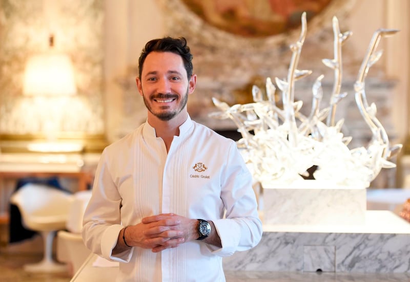 (FILES) In this file photo taken on October 25, 2017 Le Meurice's pastry chef Cedric Grolet poses during a photo session at the luxury five-star Le Meurice Hotel in Paris.  / AFP / STEPHANE DE SAKUTIN
