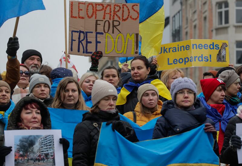 Ukrainians outside the European Council building in Brussels call for the deployment of Leopard tanks and other military equipment to Ukraine. EPA