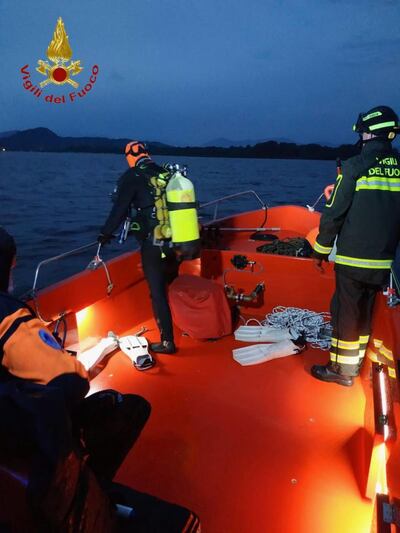 Divers during a search and rescue operation in Lake Maggiore. EPA 