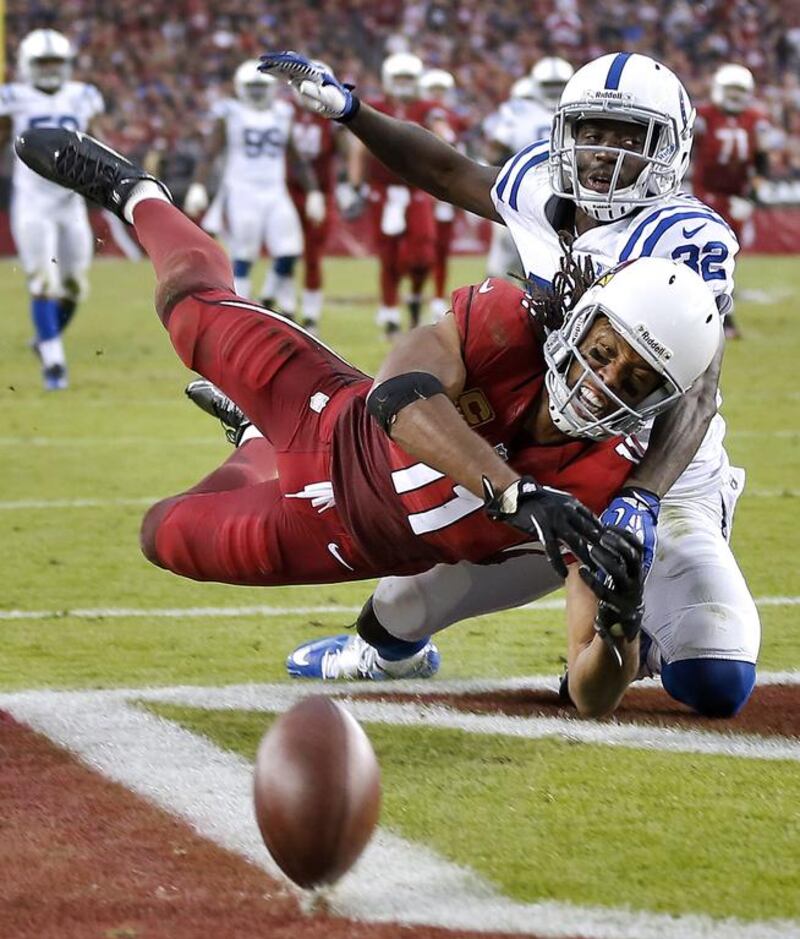 Arizona Cardinals wide receiver Larry Fitzgerald has not seen his production slow down despite catching passess from a succession of different quarterbacks. Matt York / AP Photo