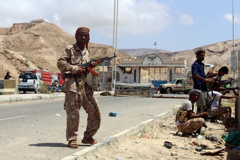 Yemeni soldiers stand guard in the southeastern Yemeni port of Mukalla (AFP Photo / Stringer)
