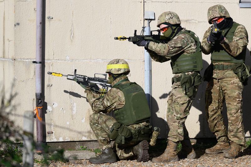 SOUTH EAST ENGLAND - NOVEMBER 09: Ukrainian military personnel take part in a training exercise at a facility on November 09, 2022 in southeast England, United Kingdom. The UK has offered to train 19,000 Ukrainian personnel, with several thousand already completing their training and returning to Ukraine since the programme was announced in June, 2022. The scheme has seen over 1,000 UK service personnel from the British Army, Royal Air Force and Royal Marines take part in running the programme. Canada, Denmark, Finland, Sweden, Norway, New Zealand, Latvia and the Netherlands have all joined the training programme. (Photo by Leon Neal / Getty Images)