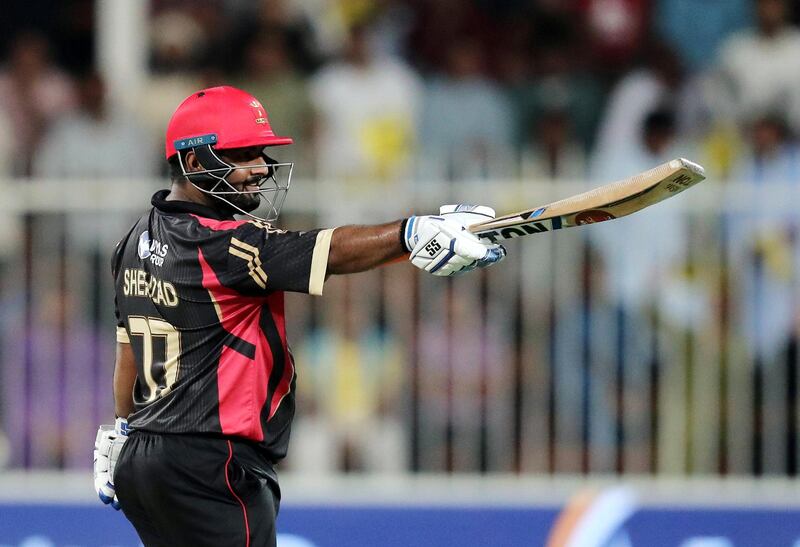 Sharjah, United Arab Emirates - November 21, 2018: Mohammad Shahzad of Rajputs scores 74 off 16 balls during the game between Sindhis and Rajputs in the T10 league. Wednesday the 21st of November 2018 at Sharjah cricket stadium, Sharjah. Chris Whiteoak / The National