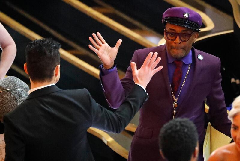 Spike Lee greets Rami Malek. Photo: Reuters