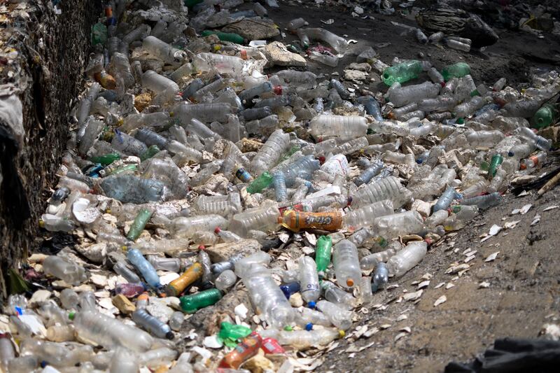 Plastic bottles pile up on the banks of the polluted Las Vacas River, in Chinautla, Guatemala. AFP