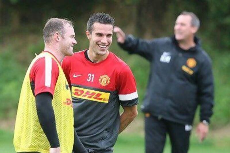 Robin van Persie will partner with Wayne Rooney, left, for the first time in a regular-season match when Manchester United visit Goodison Park to face Everton.